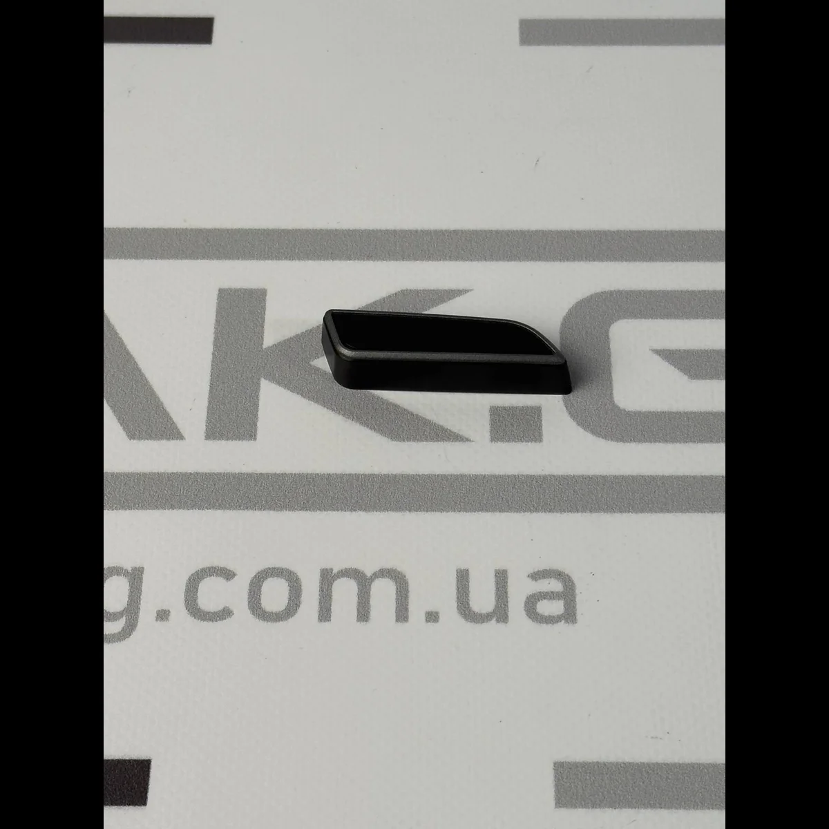 Кнопка регулювання сидіння пасажира горизонтальна