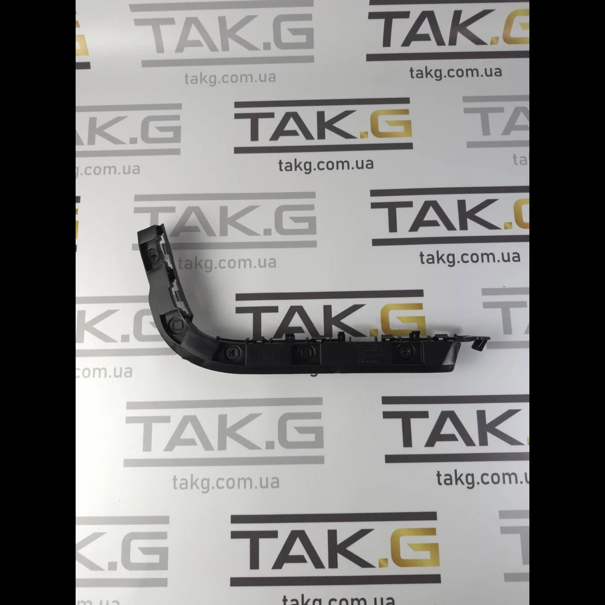 Кронштейн бумеранг заднього бампера правий