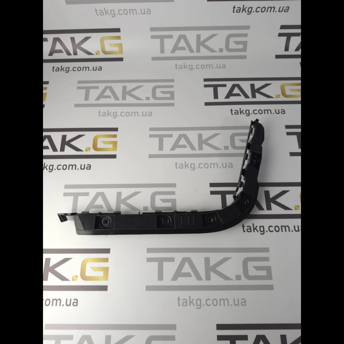 Кронштейн заднього крила бумеранг лівий