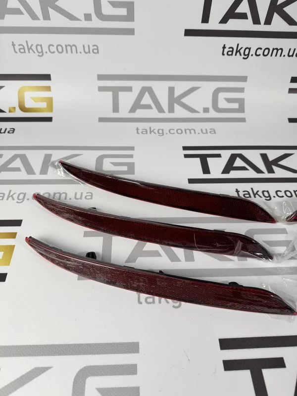 1077406-00-F: Задній катафот (відбивач) лівий - Фото 1